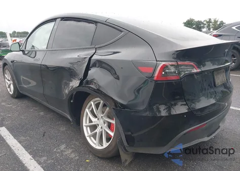 2023 Tesla Model Y Performance Dual Motor All-Wheel Drive z USA, uszkodzony, nr VIN 7SAYGDEF7PF980571